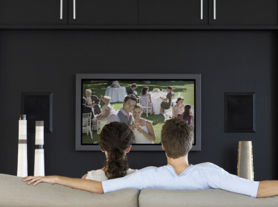 couple Watching TV on the sofa